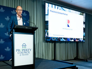 Tim Eerhard presenting the panel at the VIC Precincts and Outlook Event